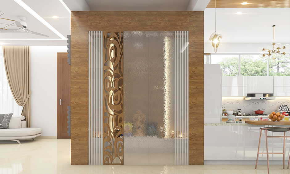 Translucent pooja room glass door designs for home which provides much needed privacy to your sacred space