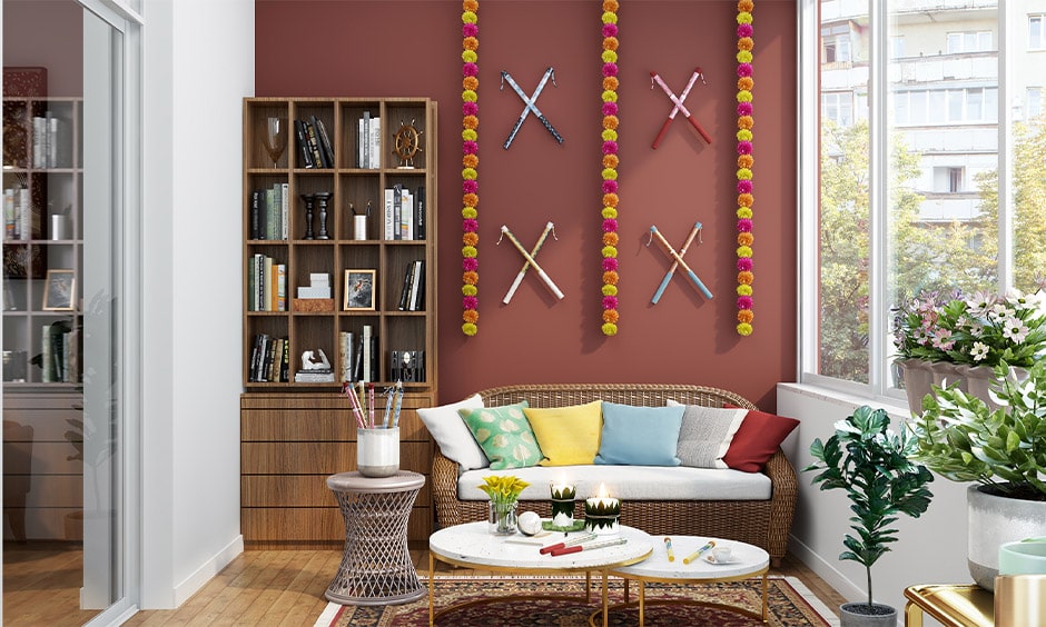 Wall decor with dandiya sticks for dussehra decoration