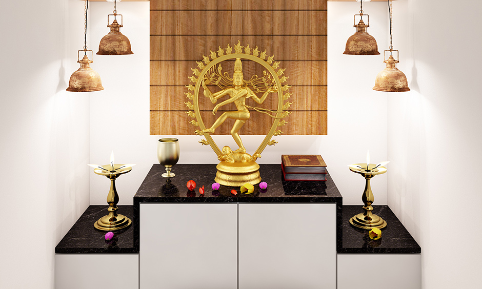 Wall-mounted plywood mandir design with the main shelf is perfect for apartments.