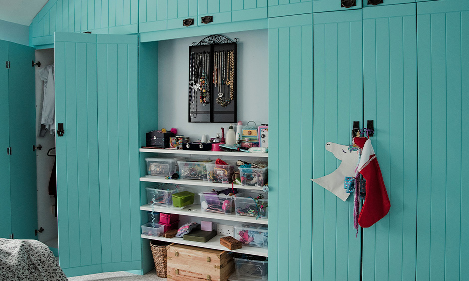 Wardrobe in light teal color paint inspired by the colour of the ocean looks everlasting breezy vibe.