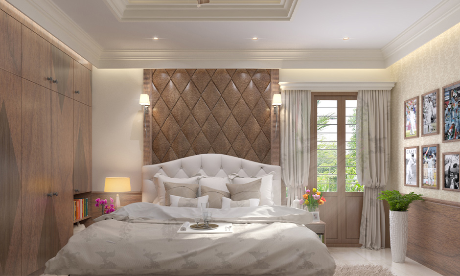 Wall mounted lamps for bedroom above the high headboard are simple yet elegant