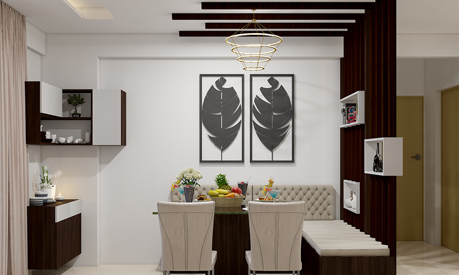 Dining false ceiling designed in dark wood panels with drop-down lighting adds to the overall vibe of the dining room.