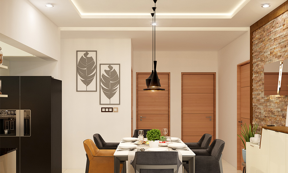 This dining ceiling designed with the combination of the cove, recessed and a decorative drop downlight elegant look.