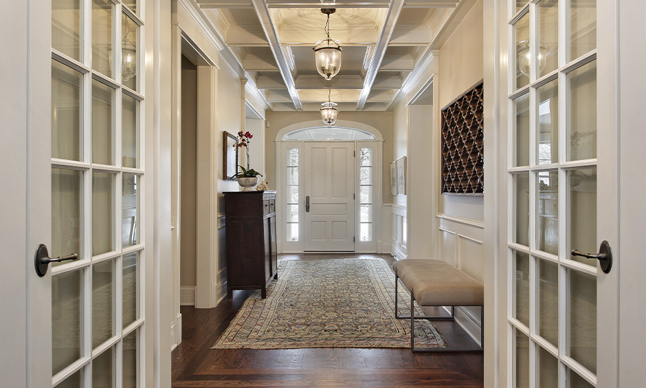 Inverted compartments lobby down ceiling design with lights and shadows