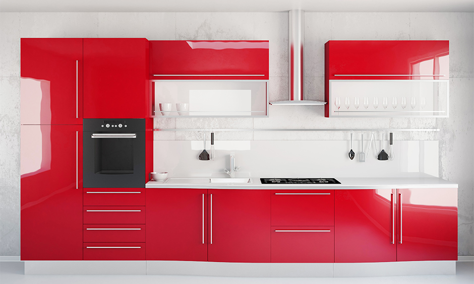 Kitchen design red white- White wall kitchen and red cabinets draws the eye