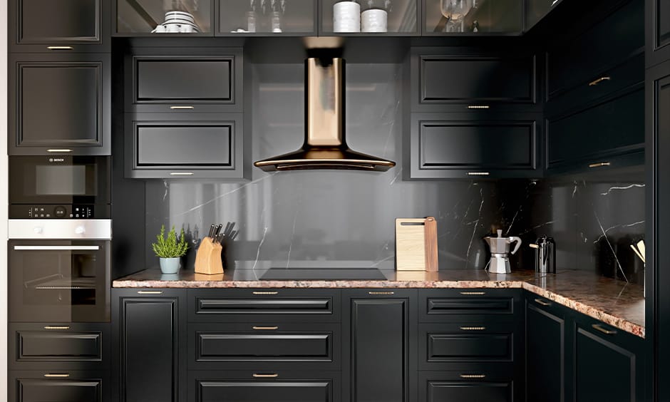 Modern kitchen design with floor-to-ceiling black cabinets provide storage spaces