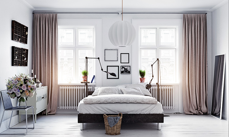 Modern scandinavian interior design bedroom which is elegantly broken by the bed and the other furniture in the room