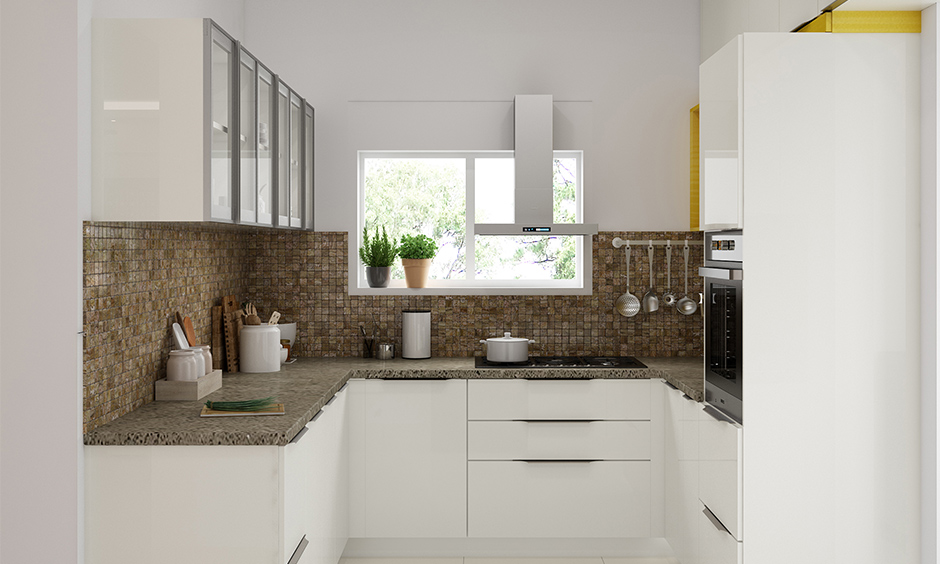 Sliding window in this u-shaped white kitchen simple yet aesthetic is the kitchen sliding window design.