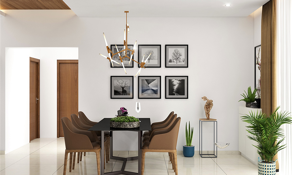 Stick hanging light in this dining room complements the interiors is the fancy lights for home decoration.