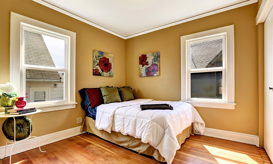 Wall colour combination for small bedroom with a golden brown