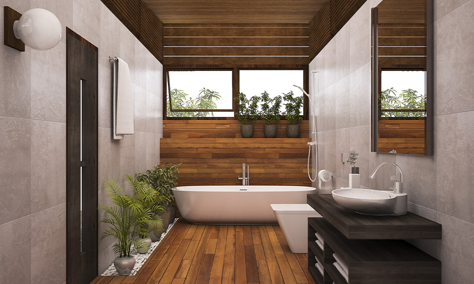 Wooden flooring best contemporary bathroom with bathtub and plants around it grant a warm look to the bathroom.