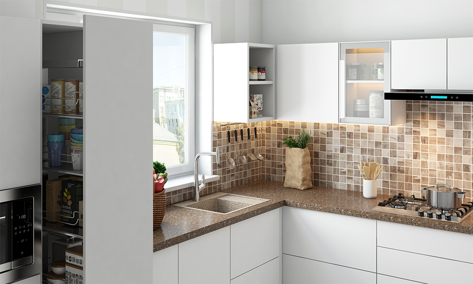 Quartz integrated kitchen sink in the brown shade with slab and small mosaic tiles in white kitchen.