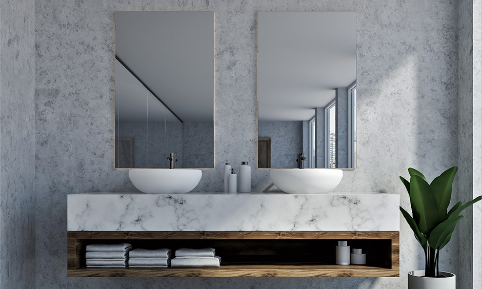 White marble bathroom countertop sitting on an open wooden-framed shelf looks stunning