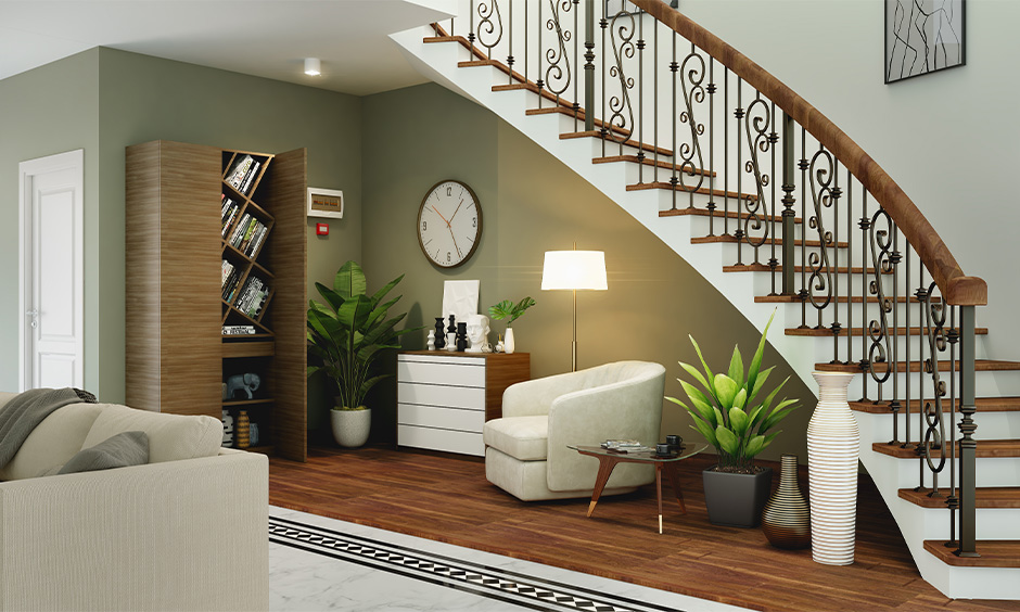 Curved concrete stair designed in the living room with wooden flooring