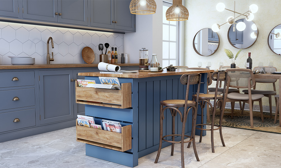 DIY custom kitchen island with built-in magazine holder made of wood and painted in a beautiful airforce blue.