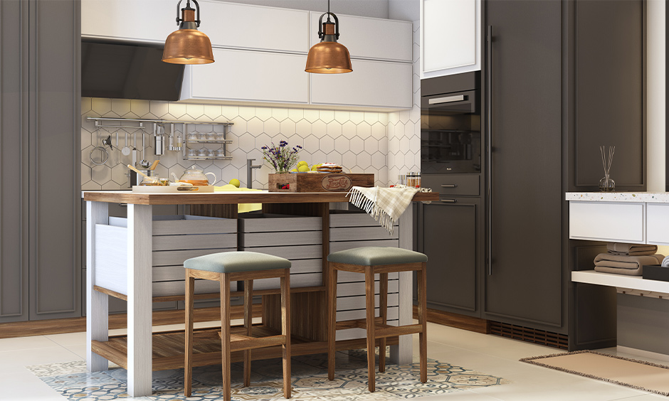 DIY kitchen island with seating made from light wood with box cabinets, two bell-shaped copper lights are elegant.