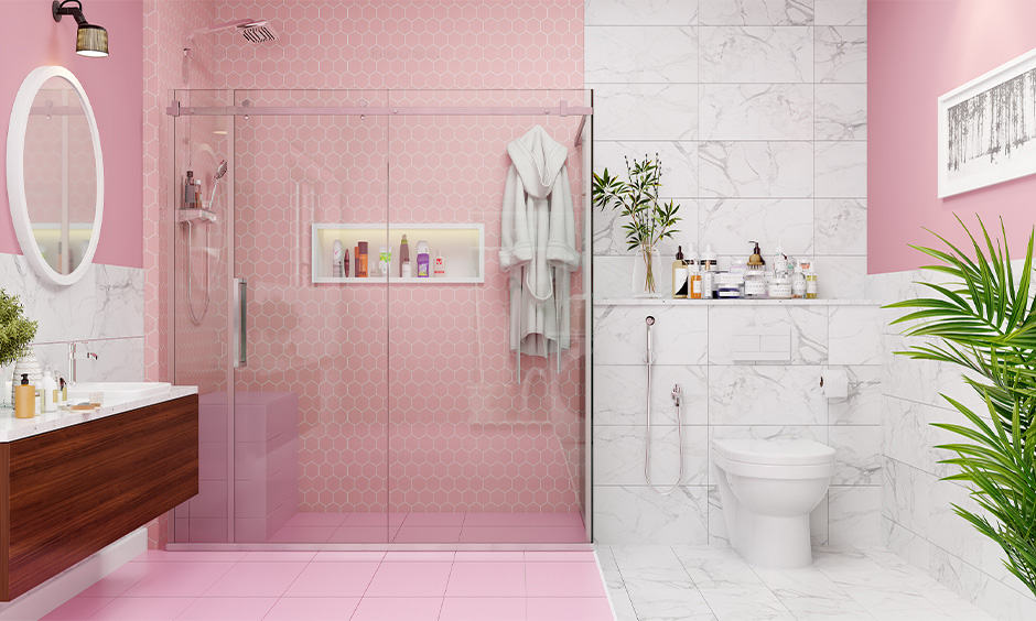 Girls bathroom with geometric shaped tiles with a white and pink theme