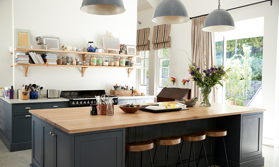 Two hanging open kitchen shelves made from timber to keep your books and jars in the kitchen island looks aesthetic.