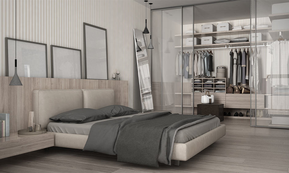 Master bedroom wardrobe walk-in-closet with glass doors