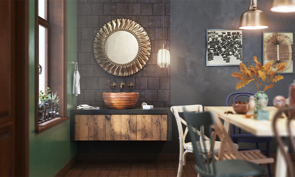 Modern dining hall washbasin made from wood on a pitch-black quartz countertop with large copper mirror looks elegant.