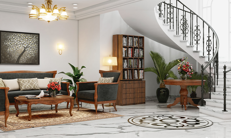 Living room features concrete stairs designed indoors in a spiral style with railings