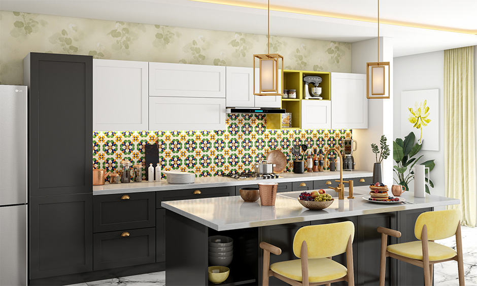 Stainless steel kitchen island with seating, backsplash with dado tiles and cabinets make this kitchen stand out.