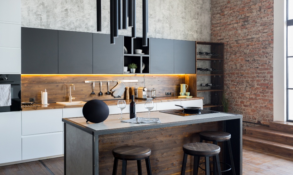 Red brick stone wall cladding in modern island kitchen looks urbane.