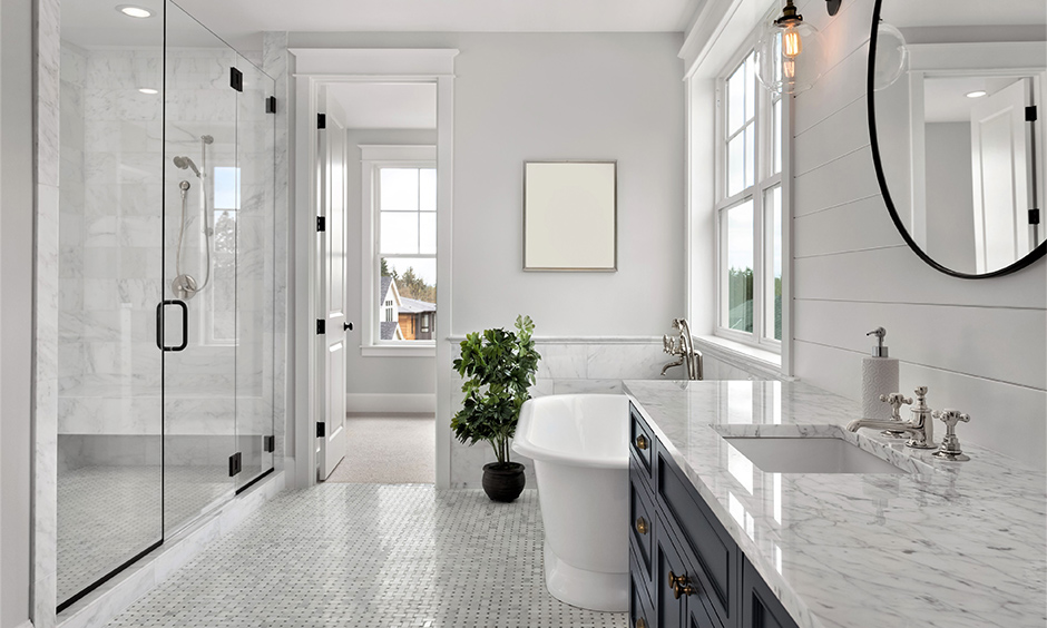 Greyish-white bathroom countertop with an integrated sink looks luxurious