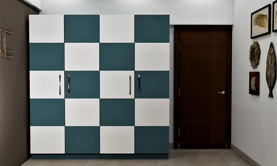 Navy blue and white check patterned wardrobe decoration in the bedroom.