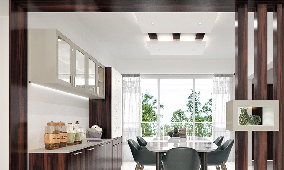 Dining room ceiling lights, cove layered lights in the white dining room gives a bold look.