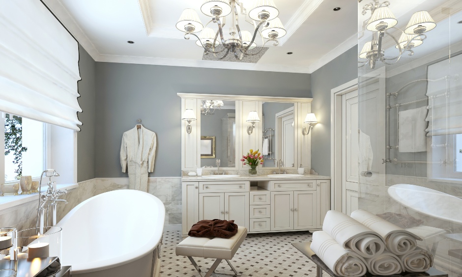 Luxurious bathroom false ceiling in a simple POP design with chandelier looks elegant.