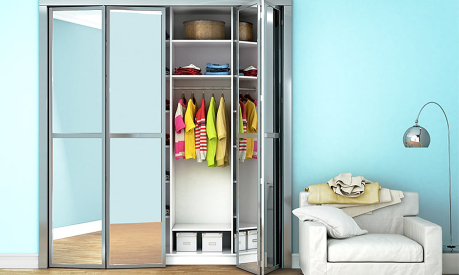 Wardrobe inside design idea, bi-folding door wardrobe with mirror outside design with shelves and a hanging rod.