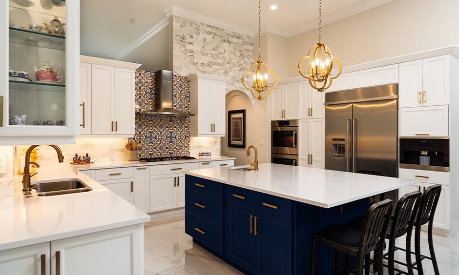 Two gold pendant light for kitchen island provides regal look