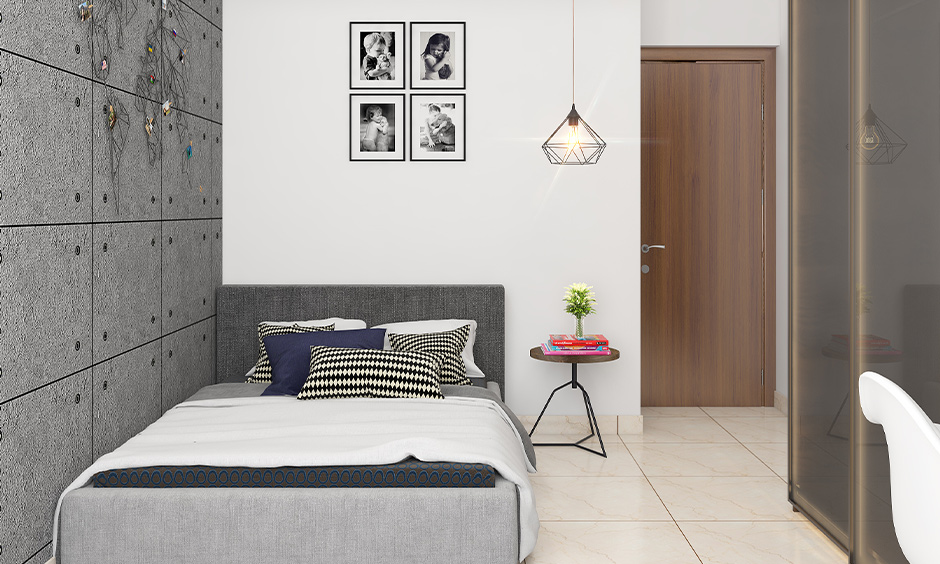 Customized grey and white bedroom walls with art 