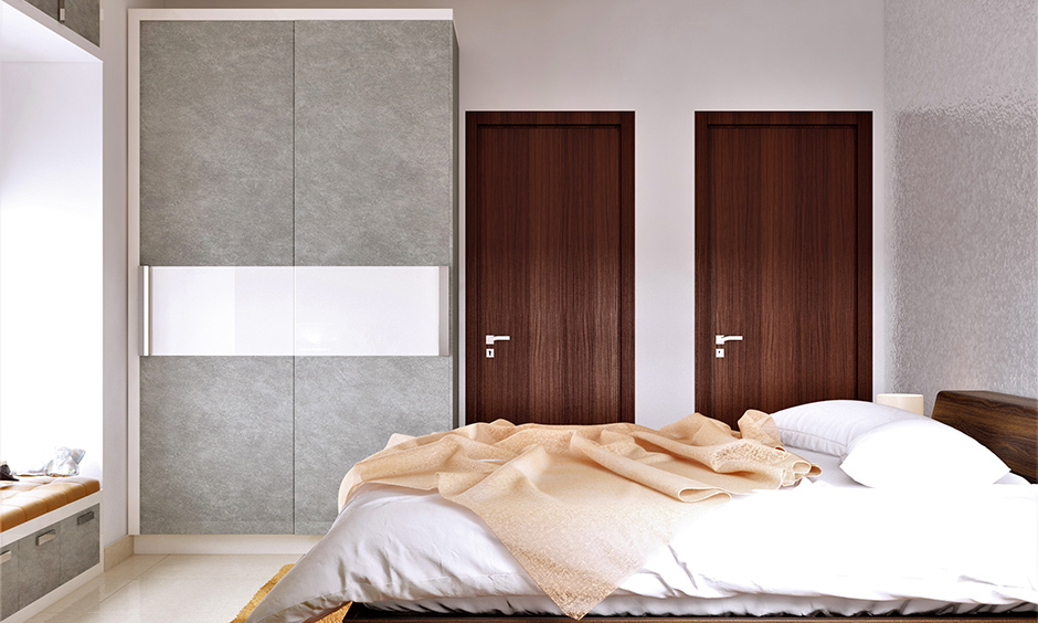 Godrej almirah colour shades in grey and white combination in the bedroom look sleek.