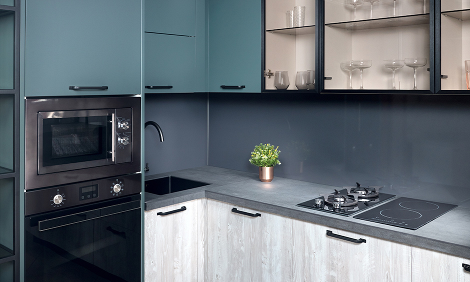 Kitchen cabinets in aqua blue paint colour finish look bright and cheerful.