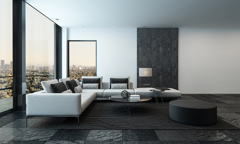 Living room design with black floor tiles with minimal decor