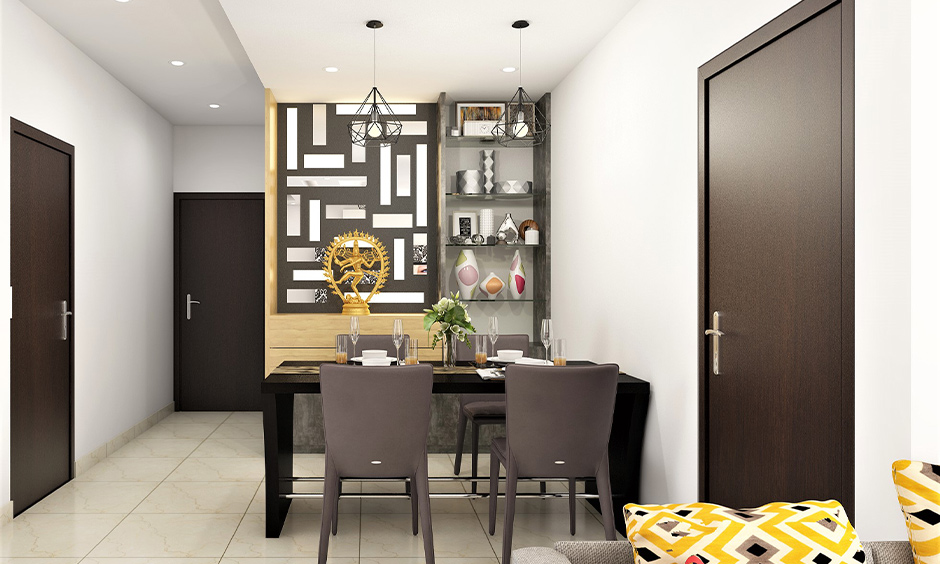 A pair of industrial-looking caged pendant lights in the dining area looks modern, ceiling lights for dining area.