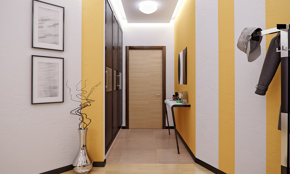 Natural yellow hallway paint ideas with white stripes which adds a fun element to home