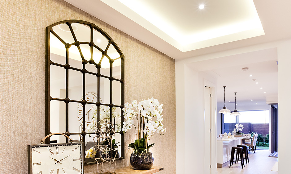 Hallway with two kinds of light design in warm yellow