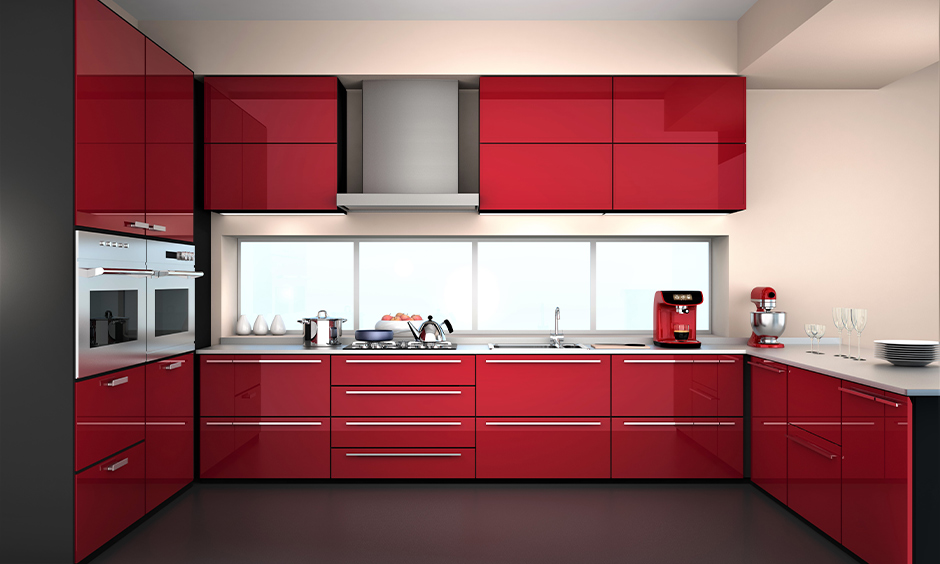 Kitchen cupboard designed and coloured in ruby red makes a very bold statement