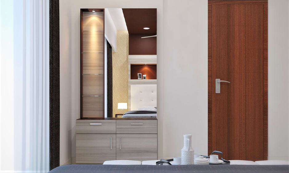 Simple dressing table designs with multiple shelves brings  classy vibe  into the bedroom