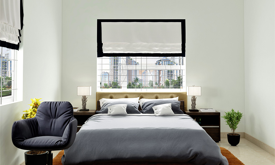 Single-hung bedroom window grill design with sashes behind bed headboard look minimalist.