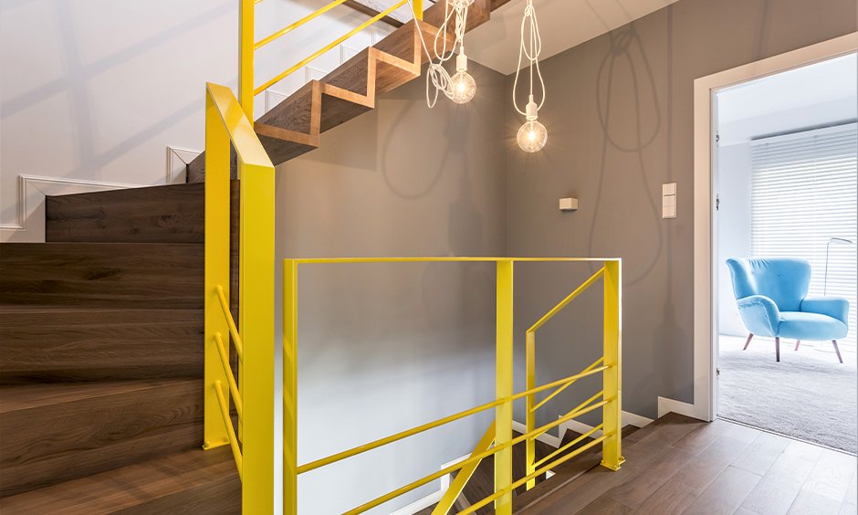 Yellow staircase railing colour instantly catch your attention