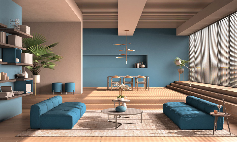 Wall furniture design for hall, a minimalist living room in tones of blue, and peach designed with open wall shelves.