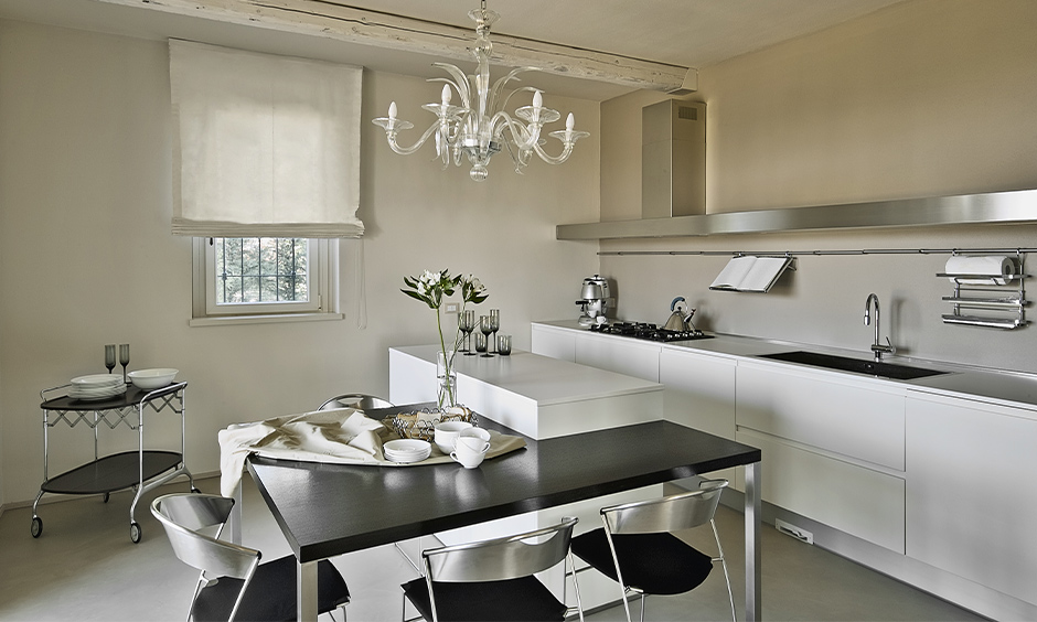 A fine dining metal kitchen cart on wheels