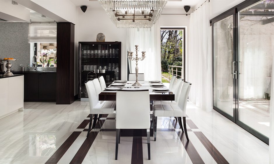 Dining area flooring in monochrome white marble designed in a checkered pattern is the best white marble for flooring.