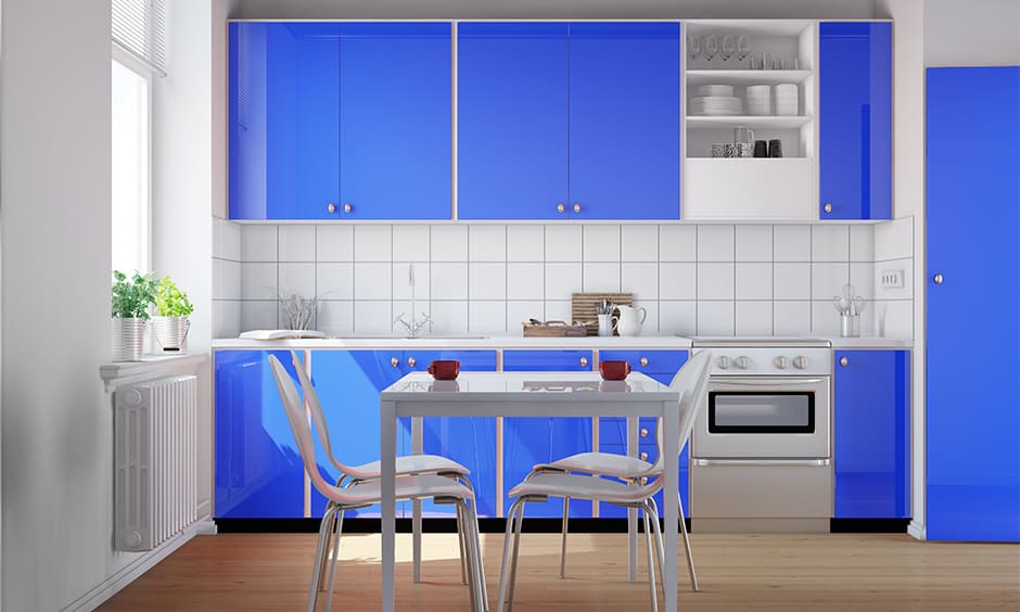 Bright blue kitchen cabinets creates quite a fun with this blue kitchen cabinets