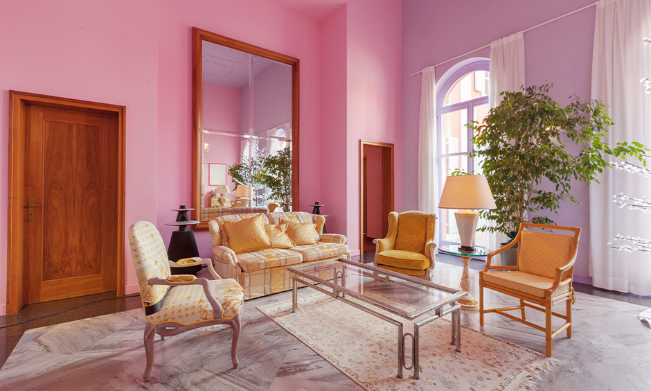 Classic pink living room decorated with old-style furniture sets