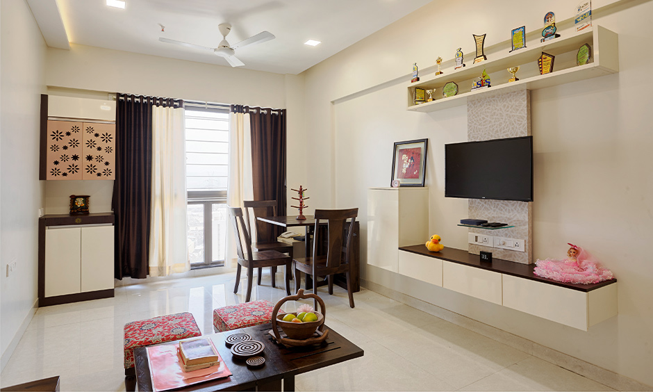 2bhk dining cum living room best designed in a minimalist style by interior designers in Mumbai